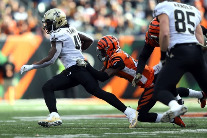 Nov 11, 2018; New Orleans Saints running back Alvin Kamara (41) breaks a tackle against the Cincinnati Bengals. Mandatory Credit: Aaron Doster-USA TODAY Sports